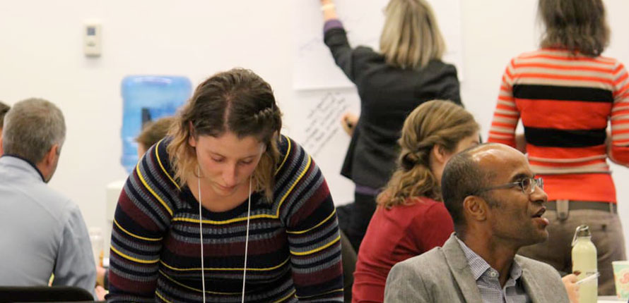 researchers working in a classroom